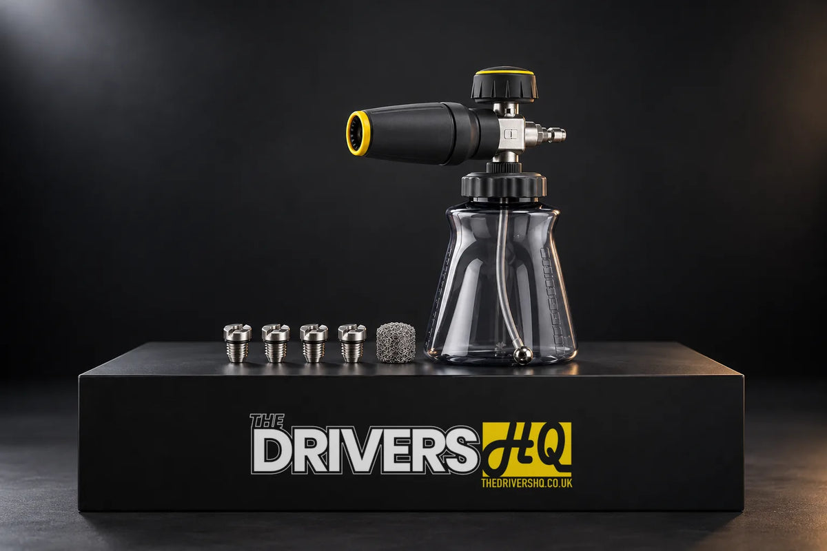 Active Premium Pressure Washer Snow Foam Cannon with its four spare nozzles and mesh filter on a black display plinth