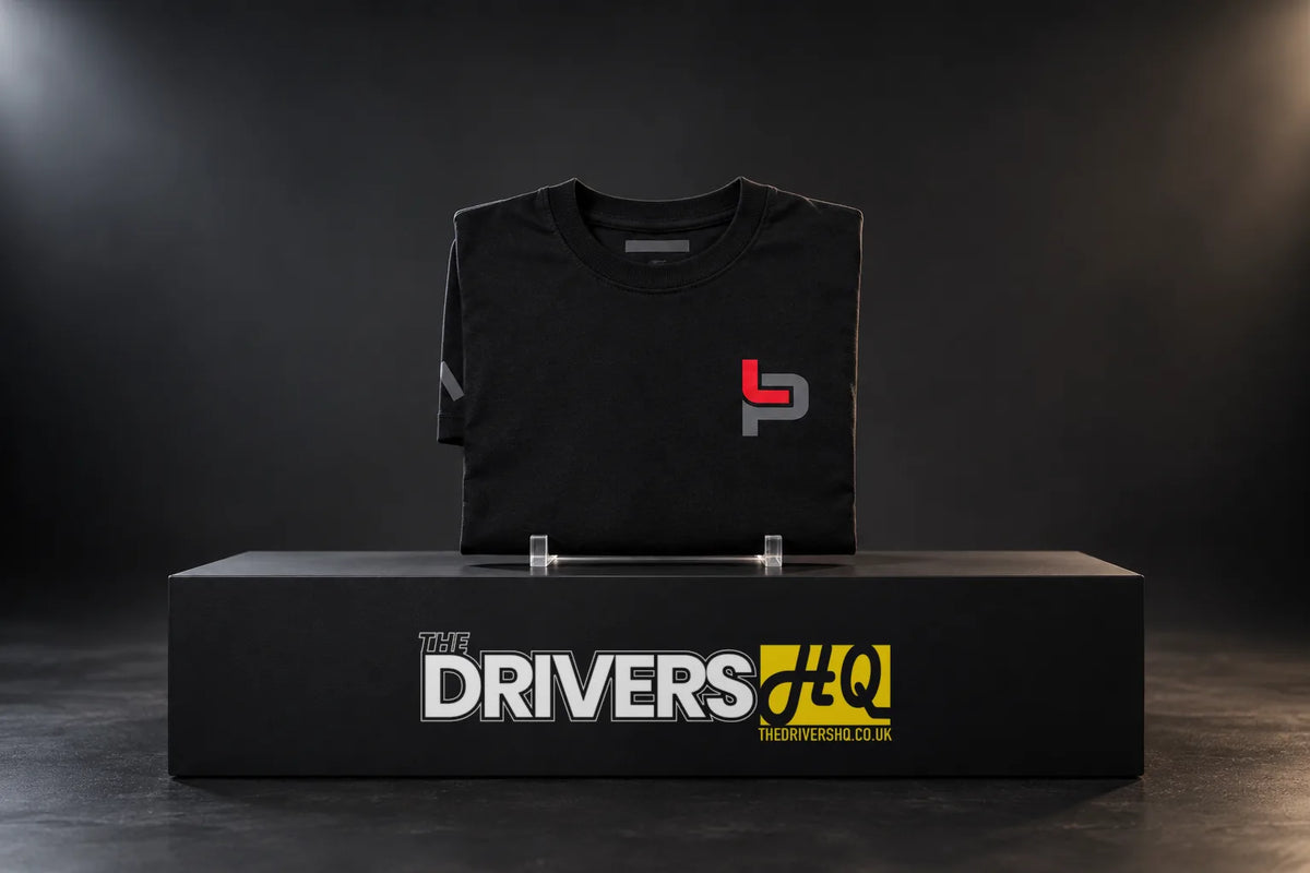 Folded black Hoonigan Leah Icon tee with the red and grey LP chest logo on a black display plinth