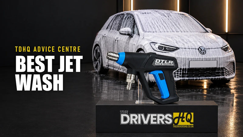Best pressure washer for car detailing UK: DTLR 2.0 Pro trigger gun on The Drivers HQ display plinth in front of a white Volkswagen ID.3 hatchback covered in snow foam