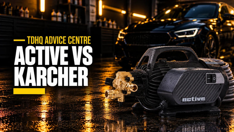 Active vs Karcher: the Active 2.3 electric pressure washer on a wet garage floor with its hose coiled behind it