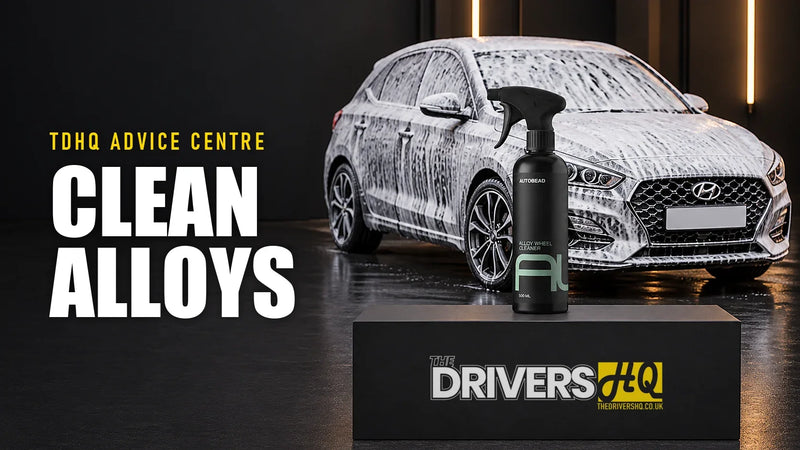 How to clean alloy wheels: AutoBead Alloy Wheel Cleaner on The Drivers HQ display plinth in front of a grey Hyundai i30 covered in snow foam