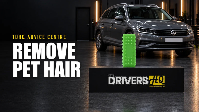 How to remove pet hair from a car: the Green Interior Pet Hair Remover Block on The Drivers HQ display plinth in front of a grey Volkswagen Passat Estate