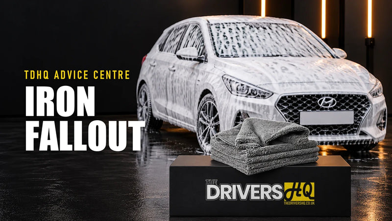 How to use an iron fallout remover: FibreKing Premium microfibre cloths on The Drivers HQ display plinth in front of a white Hyundai i30 covered in snow foam
