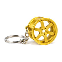 6 Spoke Wheel Key Chain keyring Gold, product photo on white