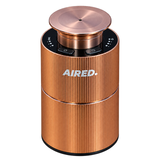 AIRED Aura mini essential oils diffuser in rose gold with fluted body on white background
