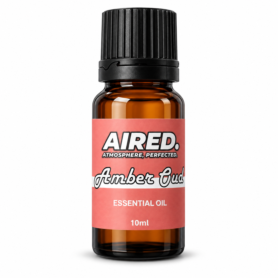 AIRED. Amber Oud Scented Essential Oil in a 10ml amber glass bottle with coral label