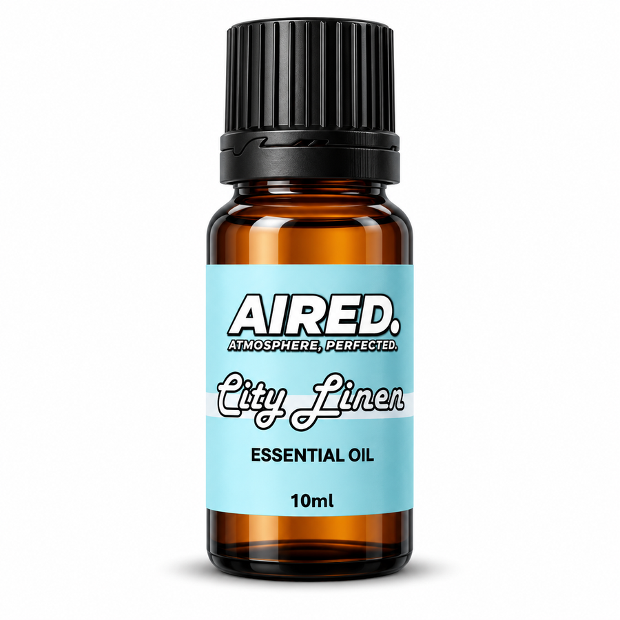 AIRED. City Linen Scented Essential Oil in a 10ml amber glass bottle with pale aqua label