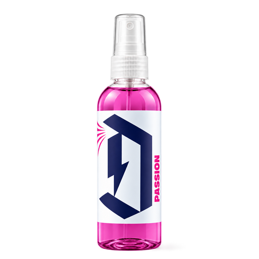 Duel Passion Car Air Freshener spray bottle with bright pink liquid and white label