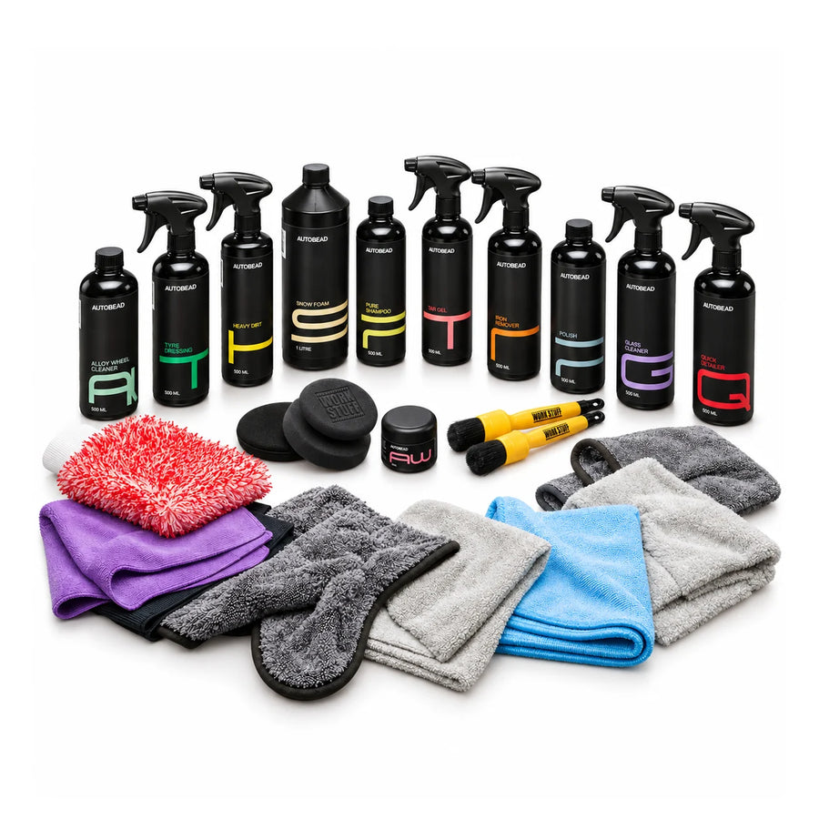 Autobead Detail Like a Pro kit with ten Autobead bottles, Autobead Wax, Work Stuff brushes and pads, wash mitt and microfibre towels on white