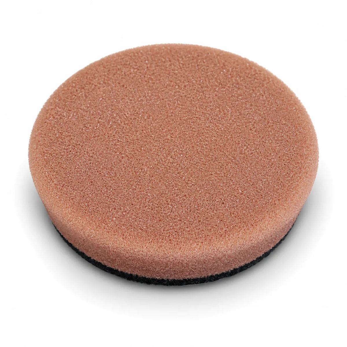 Autobead Downforce Heavy Cut 3 inch foam polishing pad in tan brown with a black hook and loop backing, studio photo on white