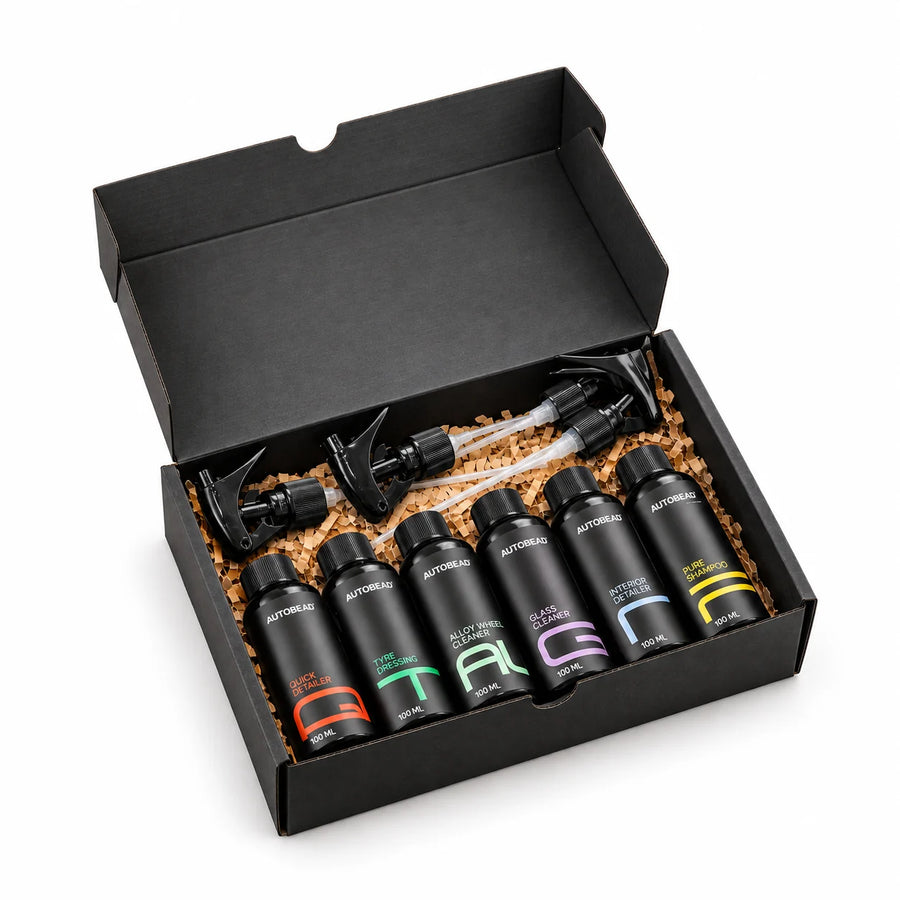 Autobead Test Drive sample kit, an open black box with six 100ml bottles and four trigger heads, on a white background