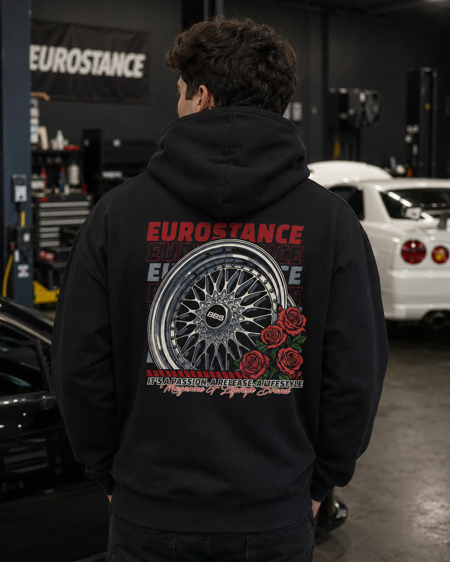 EuroStance BBS & Roses Hoodie worn in a workshop, mesh wheel and red roses back print