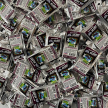 Bio-Bombs Bio-Fresh Bar Bevy Grape, a pile of many sealed foil pouches seen from above