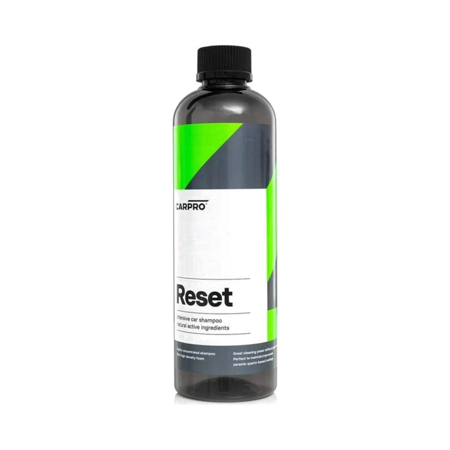 CarPro Reset intensive car shampoo 500ml bottle with a green and grey label and a black cap, product photo on white