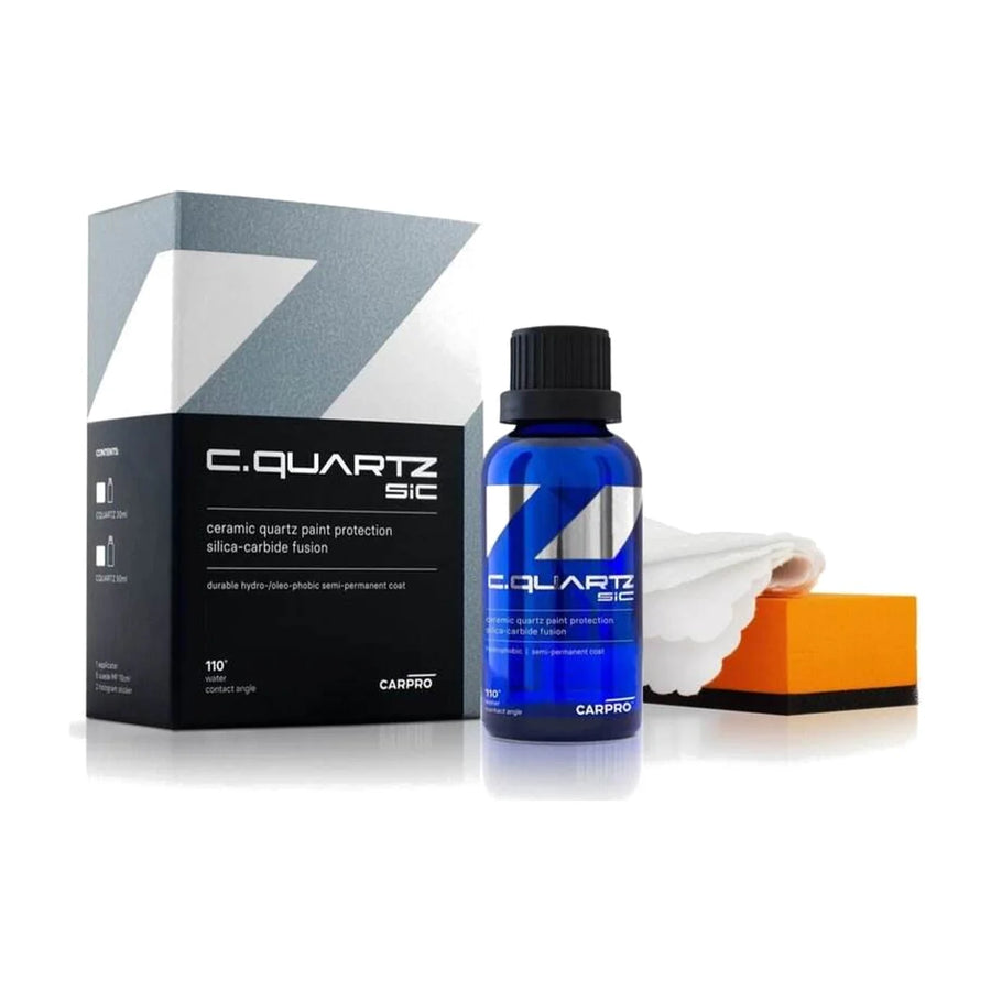 CarPro SiC CQuartz 50ml coating kit with its grey and black box, blue bottle, applicator block and cloth, product photo on white