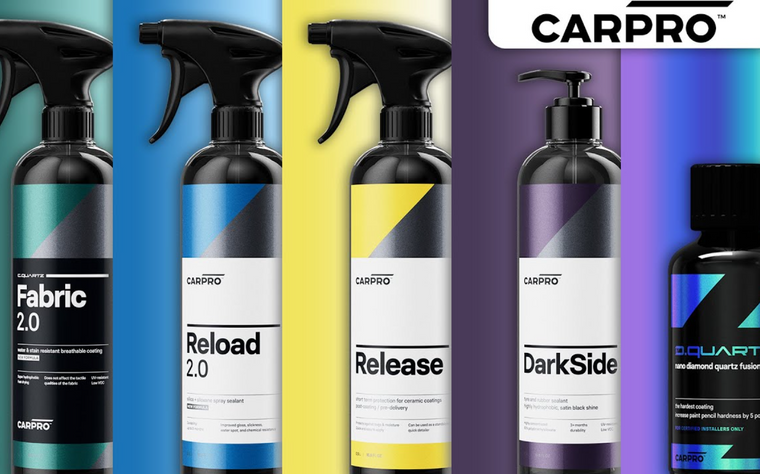 CARPRO Fabric 2.0, Reload 2.0, Release, DarkSide and D.Quartz bottles beside the CARPRO logo.