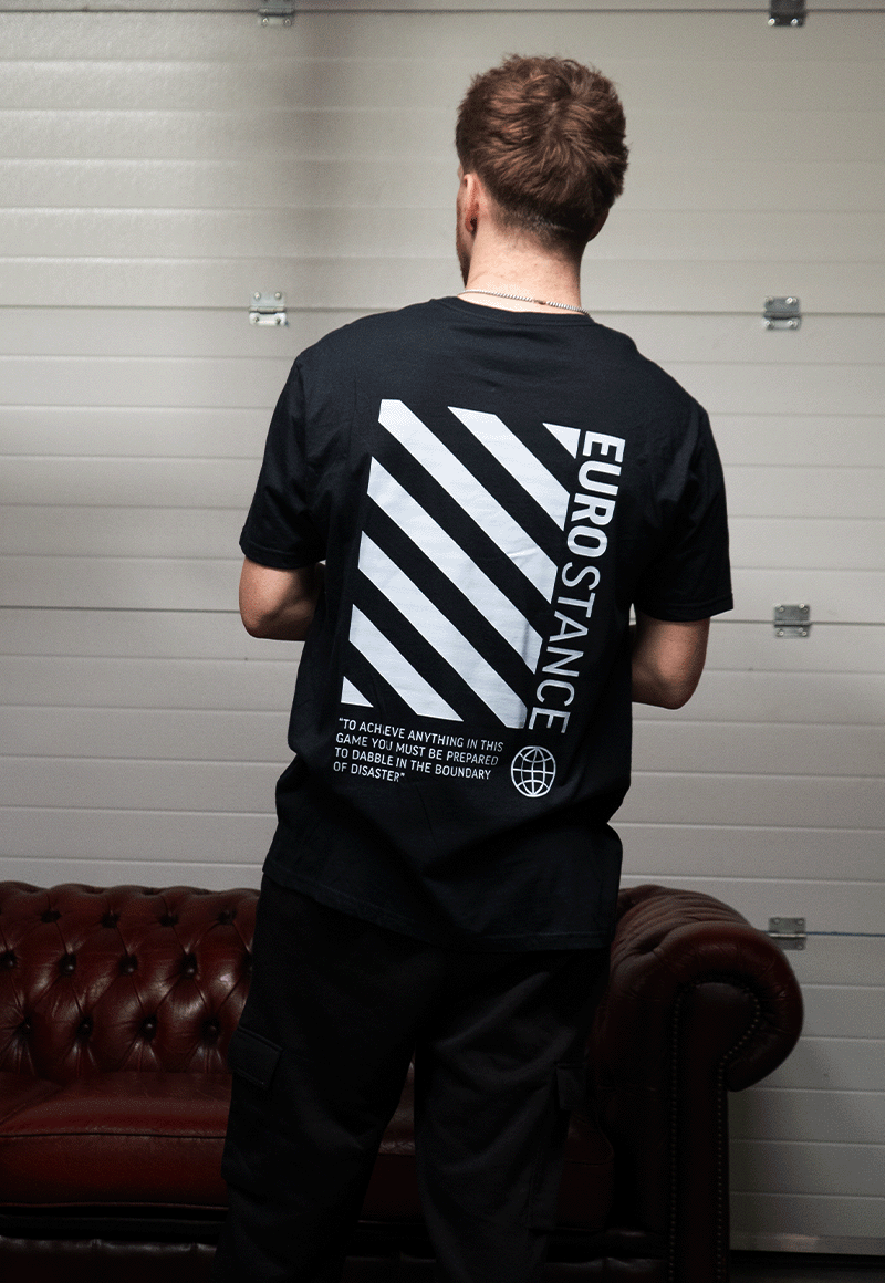 EuroStance OffStance Stiring Moss Tee black back on a model with diagonal stripe print