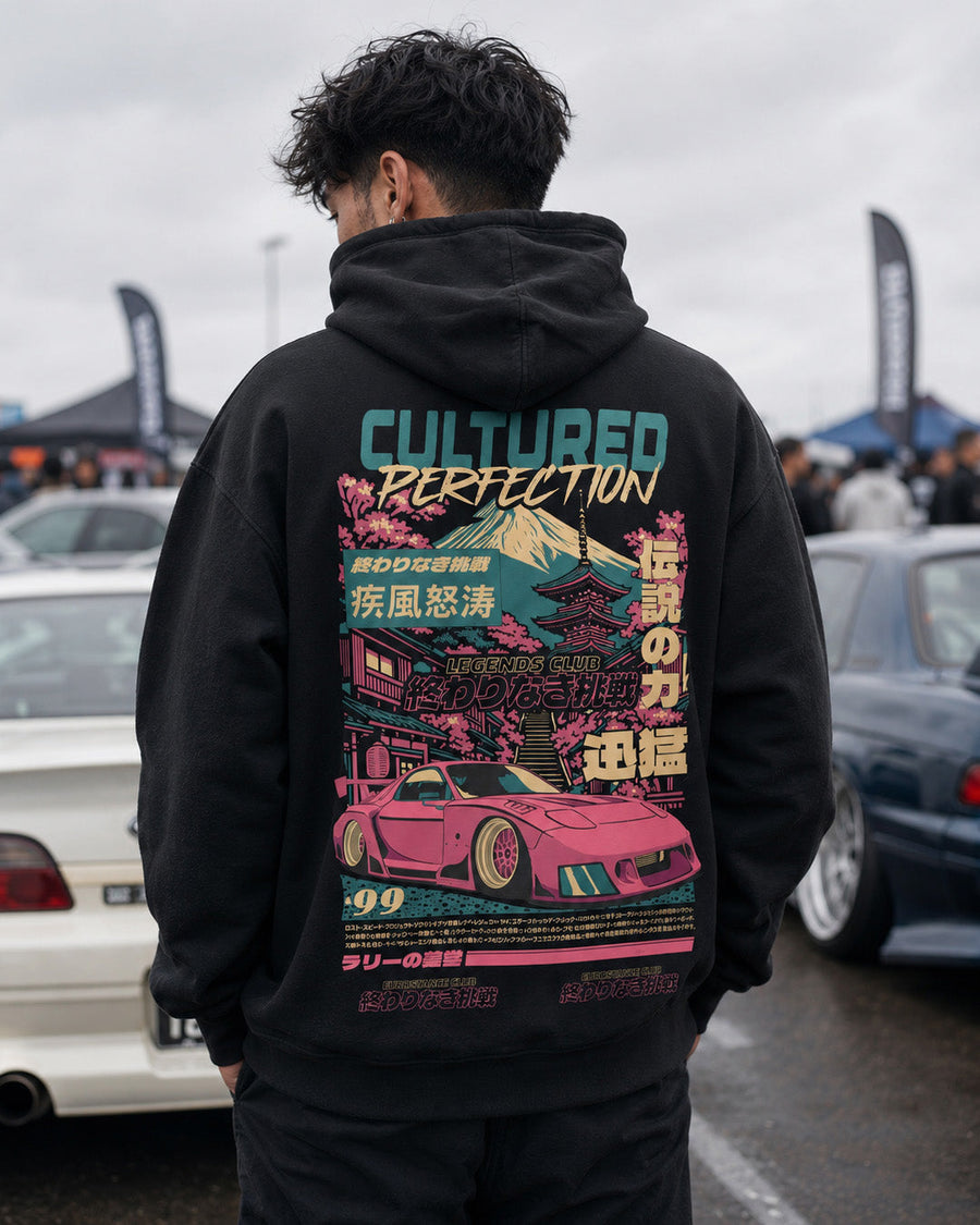 EuroStance Legends Club Cultured RX-7 Hoodie worn at a car show, back print with pink RX-7