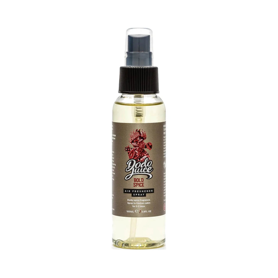 Dodo Juice Bold Spice 100ml air freshener spray with pale amber liquid and a brown label, product photo on white