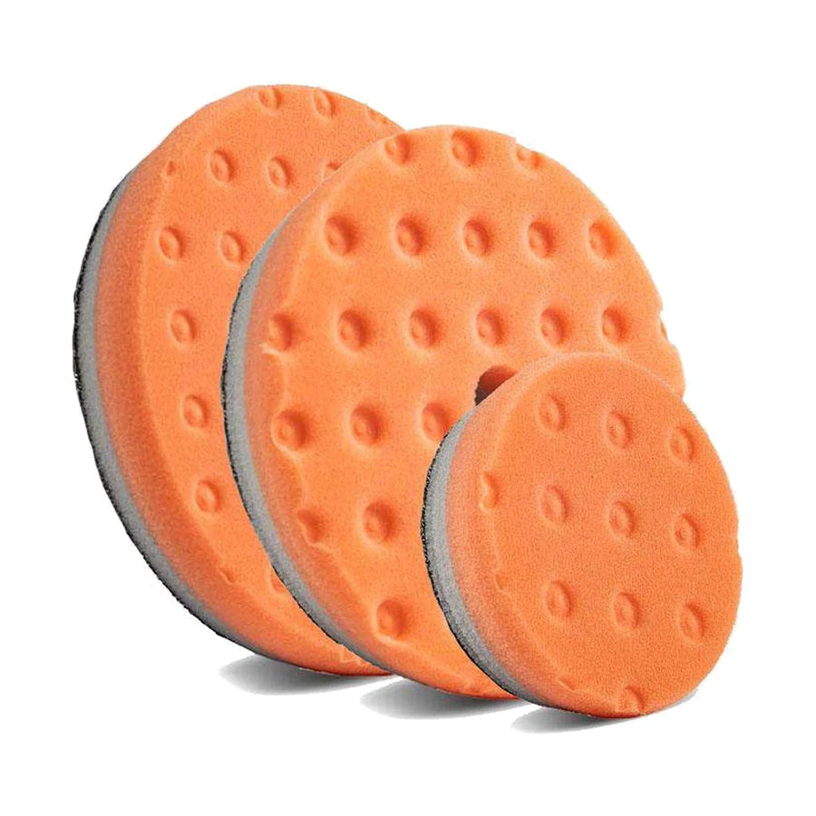 Lake Country HDO CCS orange polishing pads in three sizes with the dimpled CCS face, product photo on white