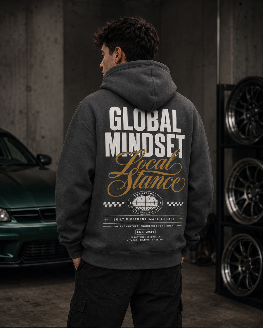 EuroStance Global Mindset Hoodie, back of the charcoal hoodie worn in a garage