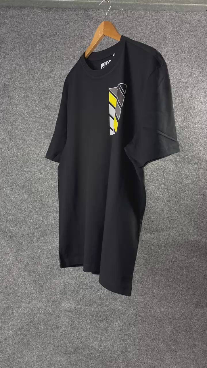 TDHQ Colourway Represent Tee, black tee on a hanger with a yellow and grey chest print