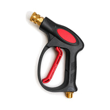 Stubby short trigger gun with a black body, red trigger and brass fittings, product photo on white