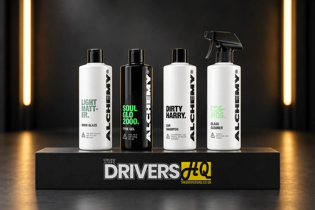 Alchemy Light Matter glaze, Soul Glo 2000 tyre gel, Dirty Harry shampoo and Cosmos glass cleaner on a black display plinth