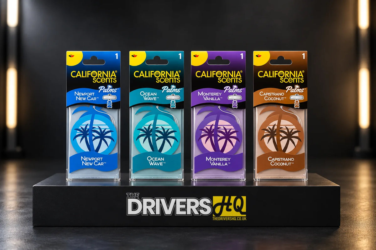 California Scents 2D Palm air fresheners in Newport New Car, Ocean Wave, Monterey Vanilla and Capistrano Coconut on a black display plinth