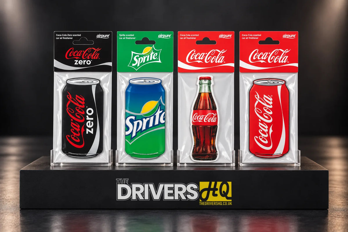 Coca-Cola Zero, Sprite, Coca-Cola bottle and Coca-Cola can car air fresheners in their packs on a black display plinth