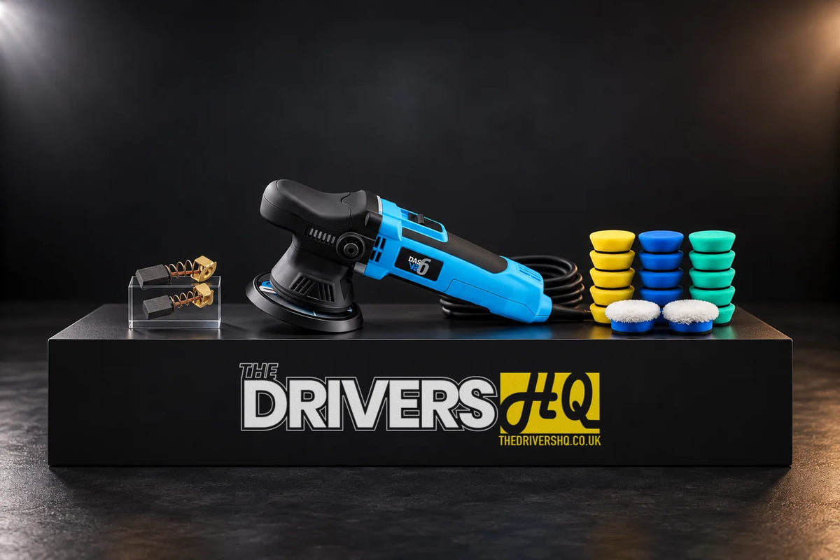 DAS-6 V2 dual action polisher, a pair of DAS-6 Pro carbon brushes and the 17-pack of 1 inch nano pads on a black display plinth