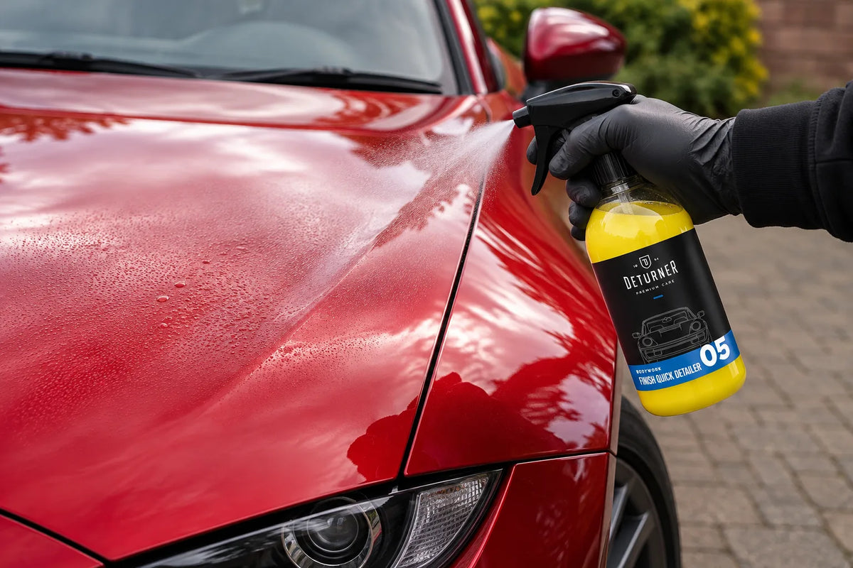Deturner Finish Quick Detailer being sprayed onto the bonnet of a red sports car