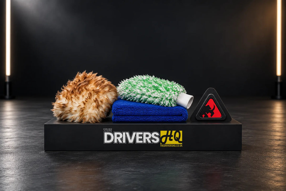 Mammoth Furry Fist mitt, Infinity XL drying towel, Fluffmeister mitt and pet hair removal tool on a black display plinth