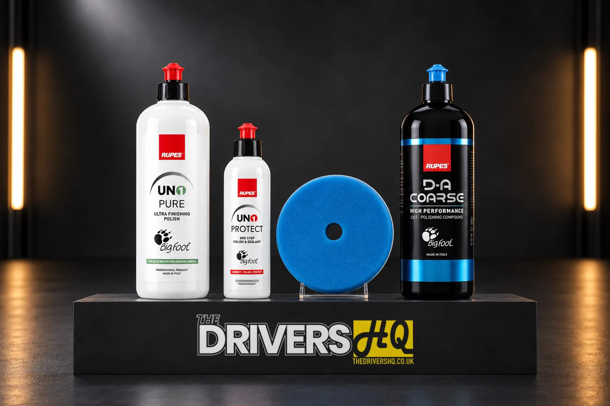 Rupes UNO Pure, UNO Protect, D-A Coarse compound and blue D-A Coarse foam pad on a black display plinth