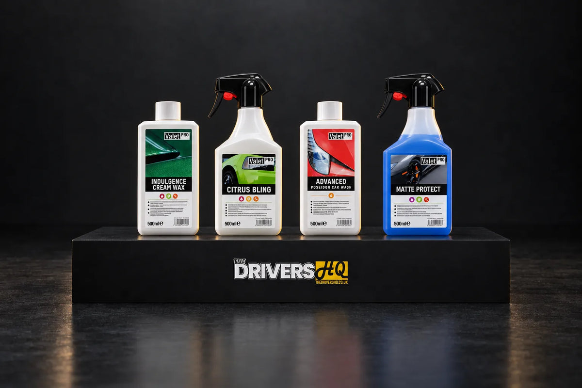 ValetPRO Indulgence Cream Wax, Citrus Bling, Advanced Poseidon Car Wash and Matte Protect on a black display plinth in a photo studio