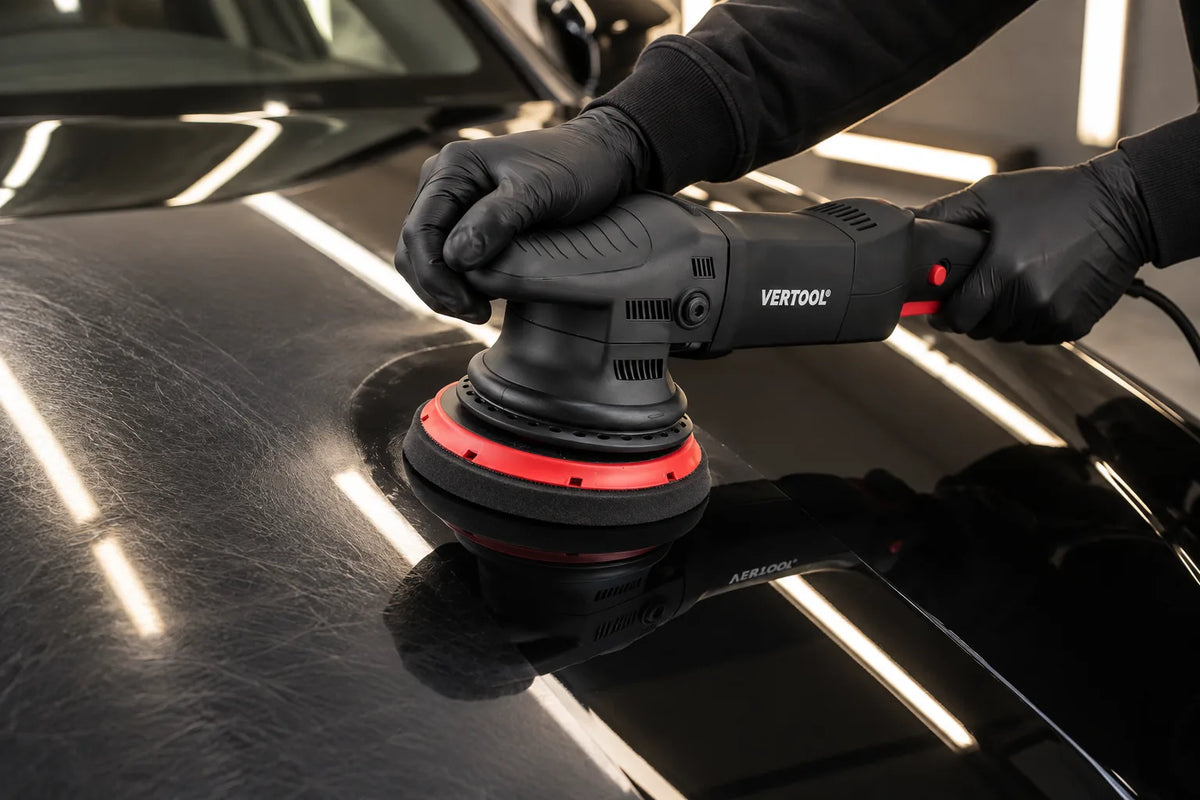 Vertool DAS-21E dual action polisher polishing the bonnet of a black car