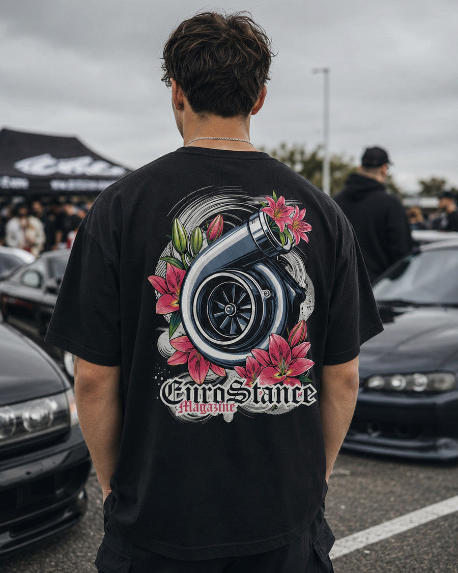EuroStance TurboCharge T-Shirt worn at a car meet, turbo and pink lily print on the back
