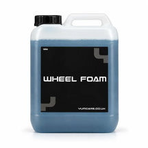 Yum Wheel Foam wheel cleaner 5 litre jerrycan with steel blue liquid and a black WHEEL FOAM label, studio photo on white
