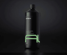 Autobead Alloy Wheel Cleaner Concentrate 1 litre black bottle with a mint green AL mark on a dark studio background
