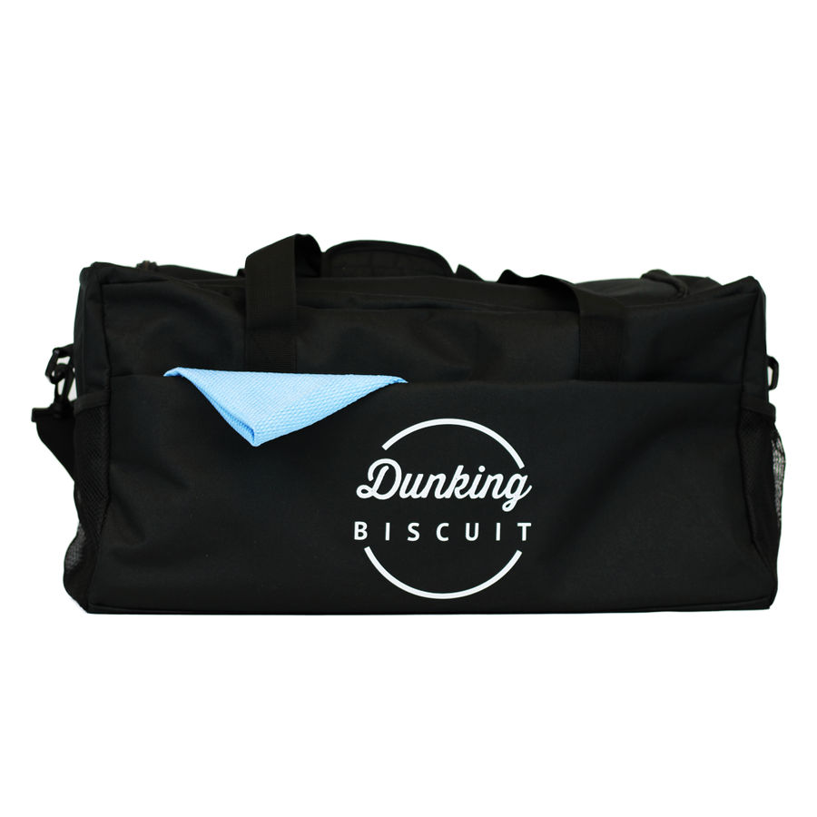 Dunking Biscuit Dunking Hauler Detailing Bag front of the black bag with white logo print